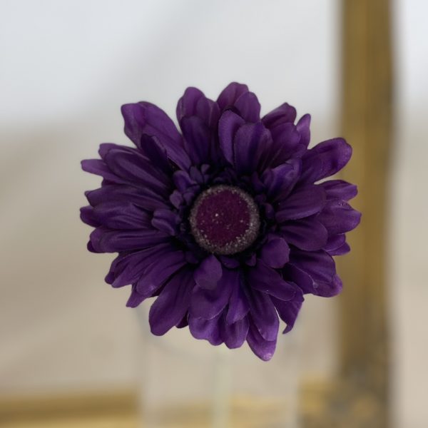 Single artificial purple Gerbera
